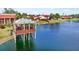 Lake view featuring gazebo with seating and lovely blue water at 1421 57Th W St # 1421, Bradenton, FL 34209