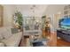 Inviting living room featuring hardwood floors, comfortable seating, and plenty of natural light at 1720 Glenhouse Dr # Gl430, Sarasota, FL 34231