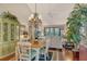 Open-concept living and dining area with hardwood floors and natural lighting at 1720 Glenhouse Dr # Gl430, Sarasota, FL 34231