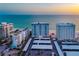 Aerial view of the condo complex and beach at 1750 Benjamin Franklin Dr # 6B, Sarasota, FL 34236