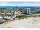 Scenic coastal view featuring beachfront condos, a road, and soft white sand at 1750 Benjamin Franklin Dr # 6B, Sarasota, FL 34236