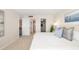 Airy bedroom with en suite bathroom access and large closet at 1750 Benjamin Franklin Dr # 6B, Sarasota, FL 34236