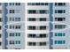 Exterior showcases a multi-story building with windows and balconies on a sunny day at 1750 Benjamin Franklin Dr # 6B, Sarasota, FL 34236