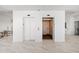 Lobby area showcasing elevators with marble floors at 1750 Benjamin Franklin Dr # 6B, Sarasota, FL 34236