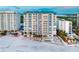 Beachfront view of Condo complex and beach access at 1750 Benjamin Franklin Dr # 6B, Sarasota, FL 34236