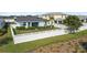 Large backyard with grass, fence, and palm tree at 17549 Timberline Pkwy, Punta Gorda, FL 33982