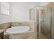 Relaxing bathroom boasting a soaking tub, separate tiled shower, and neutral tones at 17549 Timberline Pkwy, Punta Gorda, FL 33982