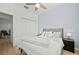 Comfortable bedroom featuring wood-look floors and neutral tones at 17549 Timberline Pkwy, Punta Gorda, FL 33982