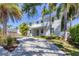 Lovely two-story home with a paver driveway and elegant landscaping at 1815 Grove St, Sarasota, FL 34239