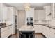 Updated kitchen featuring stainless steel appliances, granite countertops, and an island at 1815 Grove St, Sarasota, FL 34239