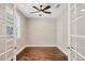 Office area features hardwood floors, neutral walls, and bright windows at 1815 Grove St, Sarasota, FL 34239