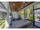 An outdoor kitchen with a large built-in grill, counter space, and ample room for dining and entertaining at 1815 Grove St, Sarasota, FL 34239