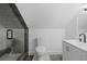 Modern bathroom featuring glass shower enclosure, white toilet, and sleek vanity at 20307 74Th E Ave, Bradenton, FL 34202