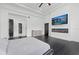 Bedroom featuring dark wood floors, modern amenities, and a bright atmosphere at 20307 74Th E Ave, Bradenton, FL 34202