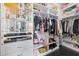 Organized walk-in closet with ample shelving, hanging space, and mirrored display cases at 20307 74Th E Ave, Bradenton, FL 34202