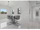 Modern dining area with stylish table and chairs with natural light at 20307 74Th E Ave, Bradenton, FL 34202