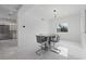 Bright dining room with modern furniture and a sleek light fixture at 20307 74Th E Ave, Bradenton, FL 34202