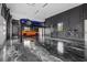 Spacious garage featuring epoxy floors and a car lift at 20307 74Th E Ave, Bradenton, FL 34202
