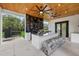 Beautiful outdoor kitchen featuring grill, granite counter and outdoor bench at 20307 74Th E Ave, Bradenton, FL 34202