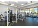Bright gym equipped with weight machines, treadmills, and scenic waterfront views at 227 Maraviya Blvd, Nokomis, FL 34275
