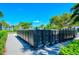 Community mailboxes lined along a sidewalk, surrounded by well-maintained landscaping at 227 Maraviya Blvd, Nokomis, FL 34275