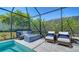 Inviting pool area features comfortable seating, perfect for outdoor relaxation and enjoyment at 227 Maraviya Blvd, Nokomis, FL 34275