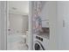 Bathroom with tub, shower, and washer dryer combo at 2640 Clubhouse Dr # 204, Sarasota, FL 34232