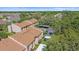 Aerial view of condo community with assigned covered parking and mature landscaping at 2640 Clubhouse Dr # 204, Sarasota, FL 34232