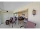 Cozy screened patio with comfortable seating and sliding glass doors leading to the interior living space at 2640 Clubhouse Dr # 204, Sarasota, FL 34232