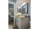 Bright bathroom with well-lit vanity, featuring neutral tones and modern fixtures, providing a clean design at 2755 Coconut Bay Ln # 1313 3M, Sarasota, FL 34237
