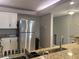 This kitchen features stainless appliances, granite countertops, and a convenient breakfast bar at 2755 Coconut Bay Ln # 1313 3M, Sarasota, FL 34237