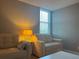 This cozy sitting area offers a quiet spot to read or relax at 2755 Coconut Bay Ln # 1313 3M, Sarasota, FL 34237