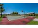Outdoor basketball court with playground and covered picnic area in a well-maintained community at 3607 Twin Rivers Trl, Parrish, FL 34219