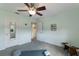 Bedroom features gray carpeting, light green walls, and a yoga mat at 3607 Twin Rivers Trl, Parrish, FL 34219