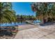 Community boat ramp and dock providing easy access to a serene lake for boating and recreation at 3607 Twin Rivers Trl, Parrish, FL 34219