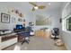 Comfortable office with neutral colors, a ceiling fan, and ample space for productivity at 3607 Twin Rivers Trl, Parrish, FL 34219