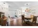 Welcoming entryway featuring tile floors, double doors, an antique cabinet, and a bright, open layout at 3890 Wilshire Cir # 27, Sarasota, FL 34238