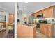 Cozy kitchen with stainless appliances, beautiful cabinetry, a granite counter tops with a breakfast bar at 3890 Wilshire Cir # 27, Sarasota, FL 34238