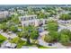 Aerial view showcases the community's lush landscaping and multiple condo buildings at 3950 Ironwood Cir # 206, Bradenton, FL 34209