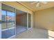 Enjoy indoor-outdoor living with this condo's balcony, featuring tile flooring and ample space at 3950 Ironwood Cir # 206, Bradenton, FL 34209