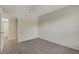 Neutral bedroom with view into walk-in closet and an exterior view at 3950 Ironwood Cir # 206, Bradenton, FL 34209