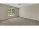 Comfortable bedroom with a large window, creating a relaxing and bright living space at 3950 Ironwood Cir # 206, Bradenton, FL 34209