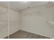 Walk-in closet with carpet and ventilated shelving for storage at 3950 Ironwood Cir # 206, Bradenton, FL 34209
