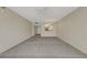 Large living room features pass through to kitchen and hall, providing flexible space and an open feel at 3950 Ironwood Cir # 206, Bradenton, FL 34209