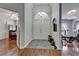 Inviting foyer with high ceilings, tile flooring, and views into other rooms at 4033 Dover E Dr, Bradenton, FL 34203