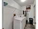 Laundry room featuring a washing machine and a dryer at 4033 Dover E Dr, Bradenton, FL 34203