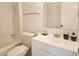 Clean bathroom featuring a single vanity, a shower-tub combination, and modern fixtures at 4058 Gatewood Dr, Sarasota, FL 34232