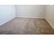 Cozy bedroom featuring plush carpet at 4058 Gatewood Dr, Sarasota, FL 34232