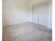 Comfortable bedroom featuring carpet floors and a sizable closet at 4058 Gatewood Dr, Sarasota, FL 34232
