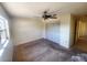 Spacious bedroom featuring carpet floors, a ceiling fan and a sizable closet at 4058 Gatewood Dr, Sarasota, FL 34232